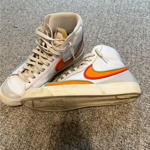 Nike White High-Tops with Red and Orange Accents